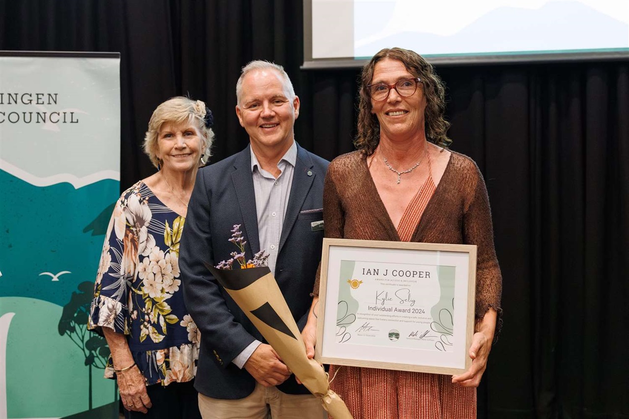 Kylie Selig accepting award with Mayor Cr. Steve Allan and Cr. Jo Brotherton (Jay and The Trees photography)