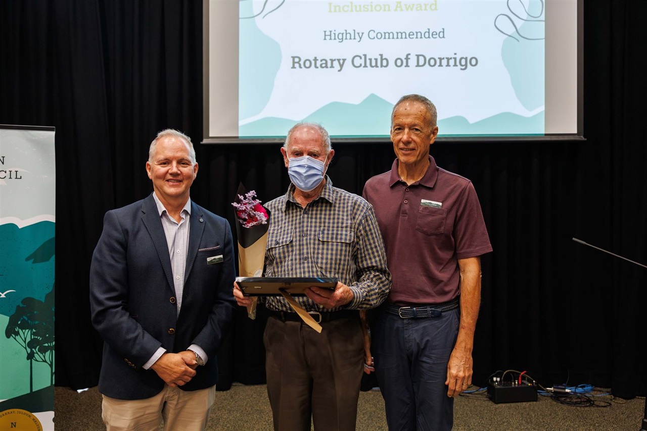 Rod Holmes accepting award on behalf of Rotary Club of Dorrigo with Mayor Cr. Steve Allan and Cr. Andrew O’Keeffe (Jay and The Trees Photography)