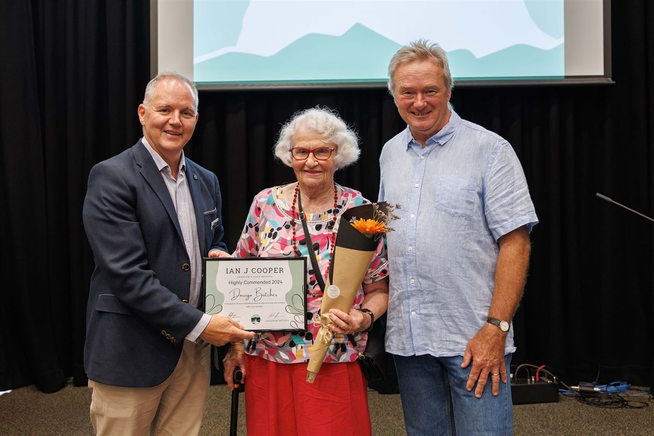 Ruth Holmes accepting award on behalf of Dorrigo Butcher with Mayor Cr Steve Allan and Cr. Graeme Shephard (Jay and The Trees Photography)