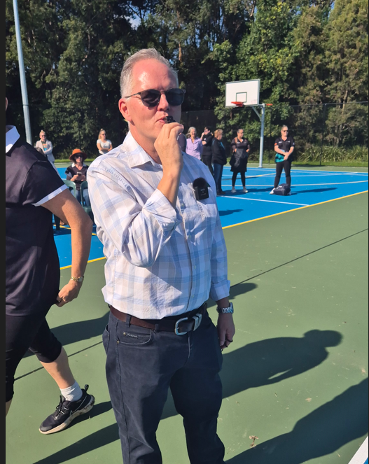 Mayor blows whistle netball.PNG